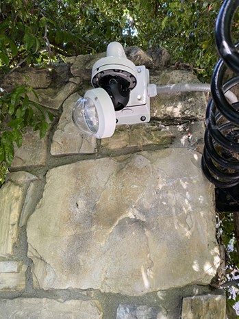 Security camera installation on a residential gate